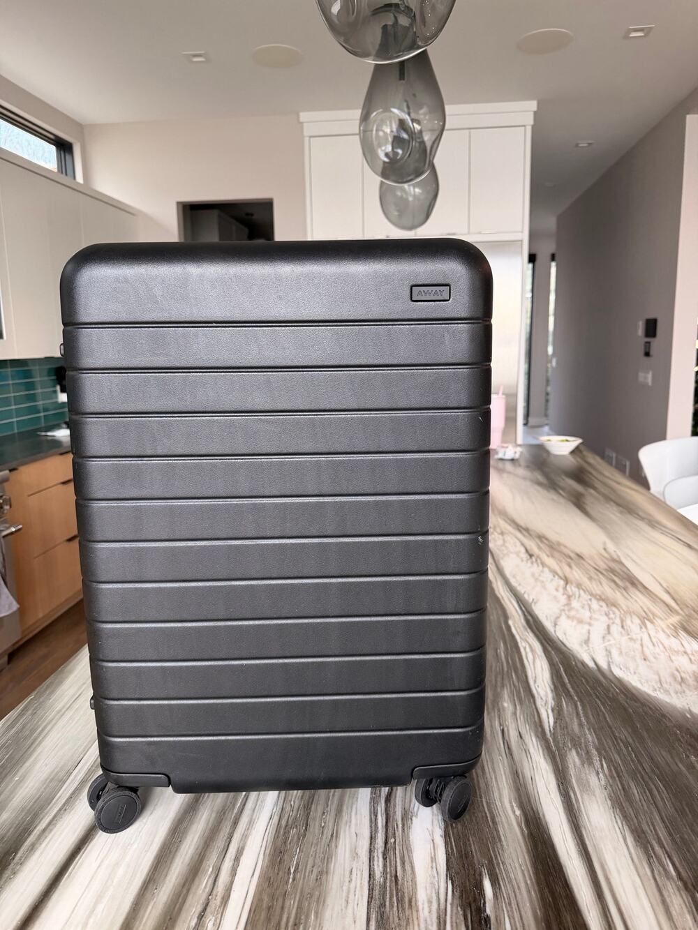 AWAY 24 in checked in luggage BLACK